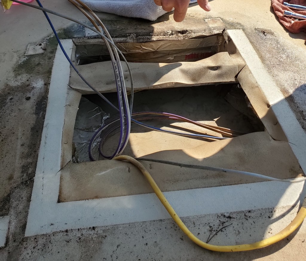 Photo showing a customer's RV that had an A/C unit installed incorrectly